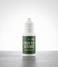 Fruit Fly Defense Sink Drops bottle — natural peppermint, cedarwood, and lemon formula to stop fruit flies breeding in drains