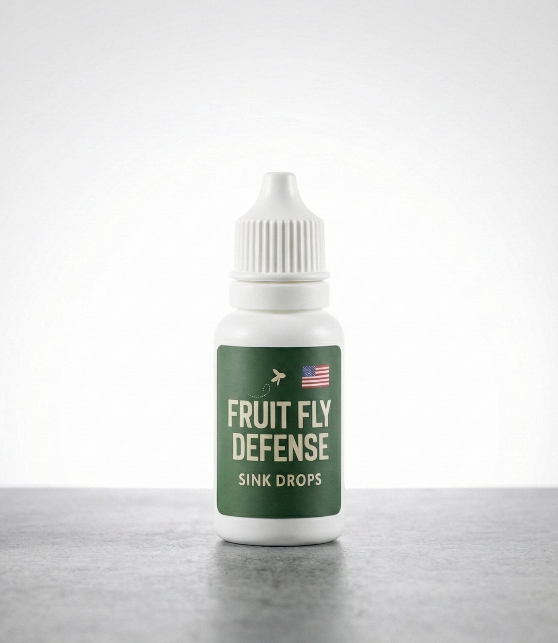 Bottle of 'Fruit Fly Defense Sink Drops' on a white background. Industry leading fruit fly deterrent meant for homes, kitchens, commercial applications.